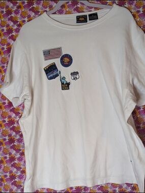 Vintage White Short Sleeve Tee with Multicolor Travel Patch Graphics